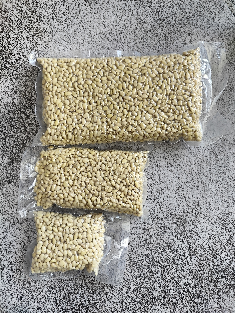 Vacuum-packed Siberian pine nuts in 100g, 200g and 500g sizes
